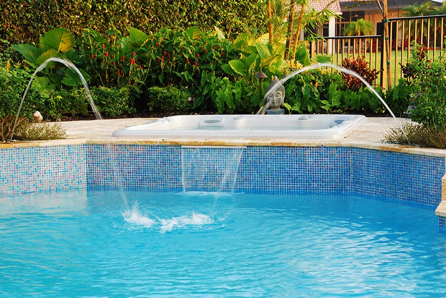 A pool renovation with a fountain