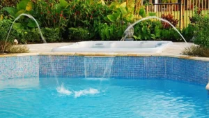 A pool renovation with a fountain