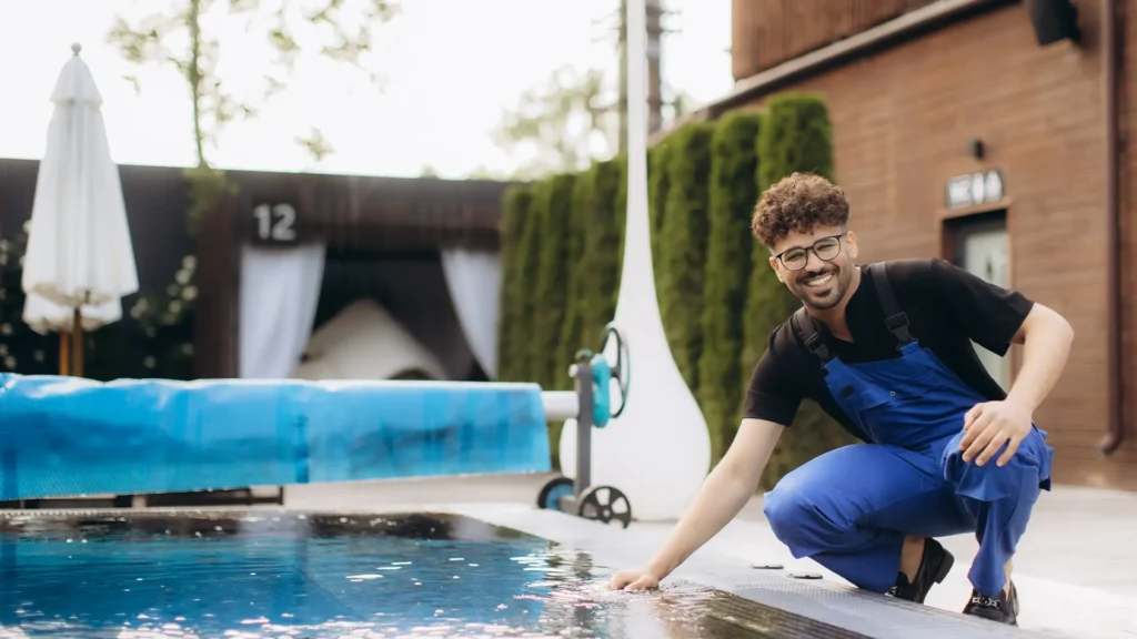 Happy pool technician after completing repair highlighting professional pool care vs DIY in Port Charlotte