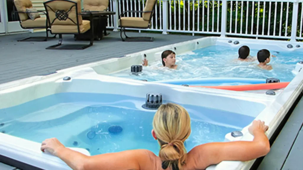 Family enjoying residential in-ground spa highlighting spa heater repair importance
