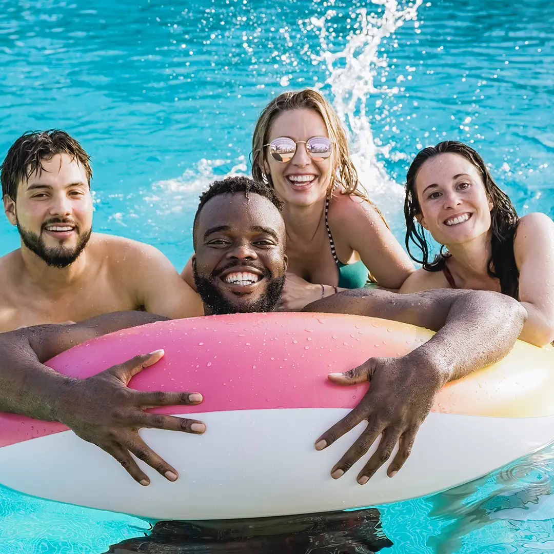 Family having fun in a heated pool in Orlando