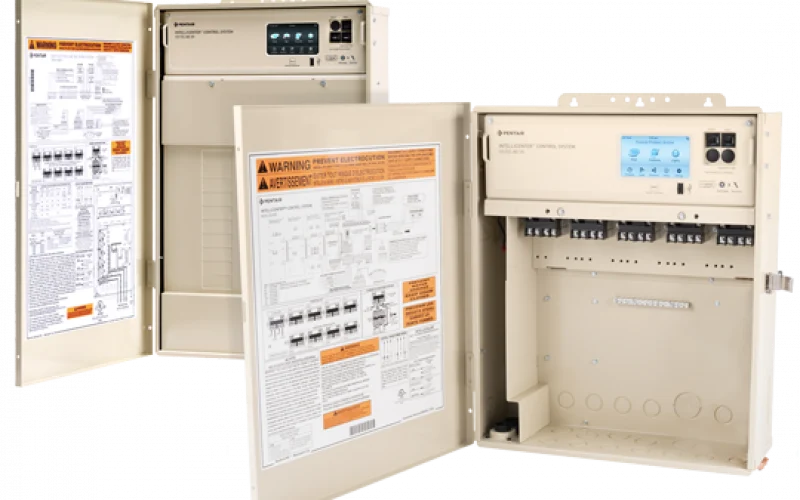 A Pentair IntelliCenter pool control panel with a touchscreen display, mounted on a gray outdoor enclosure